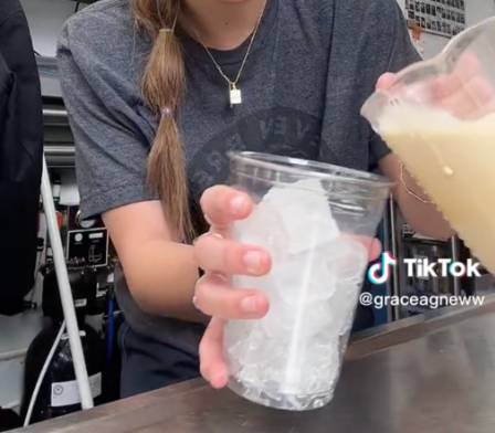 pour coffee in cup with ice