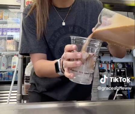 pour coffee mixture to cup with light ice