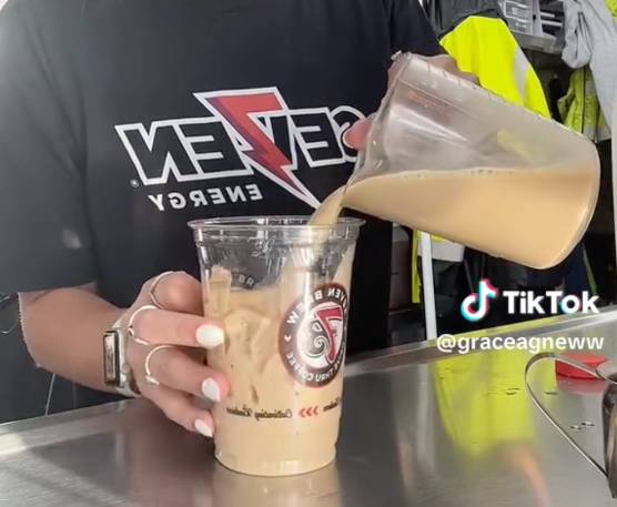 pour coffee mixture into cup with ice