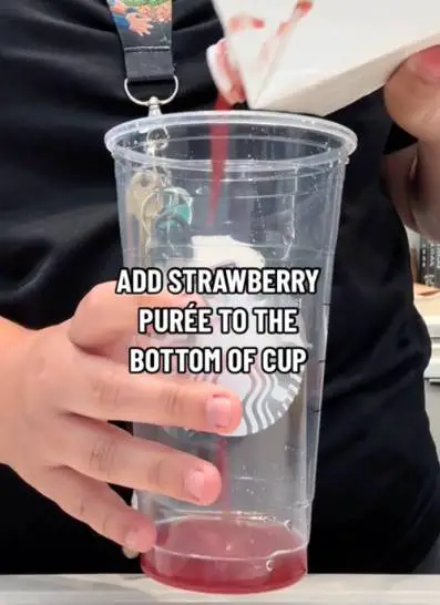 Add strawberry puree to starbucks cup bottom