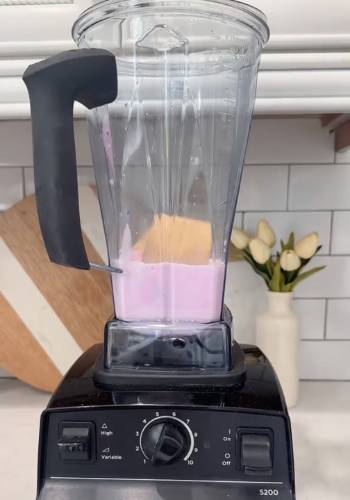 add pink cotton candy ice cream milk cracker in blender