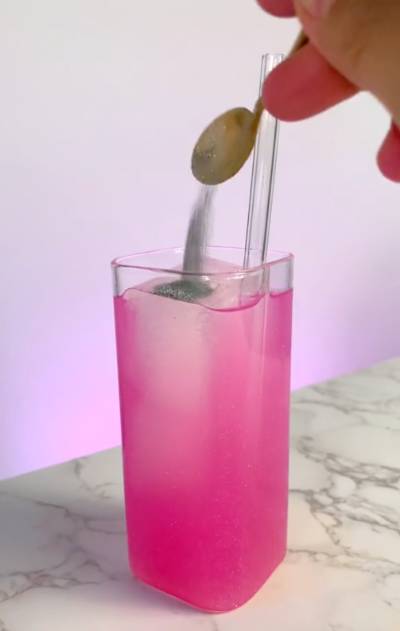 add silver glitter to barbie pink beverage