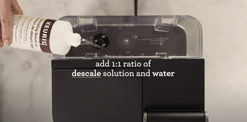 add same water descale solution into keurig duo into water reservoir