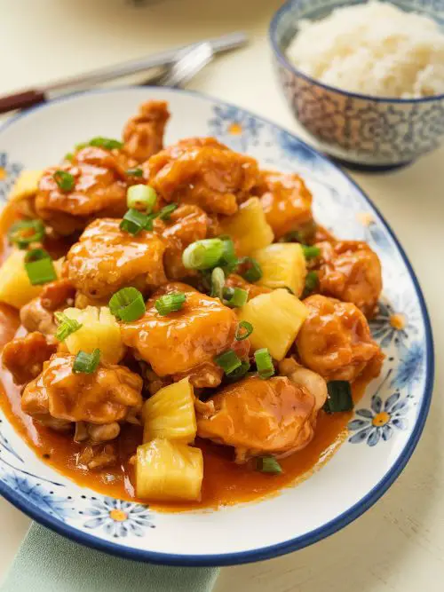 serve Chinese Pineapple Chicken with rice