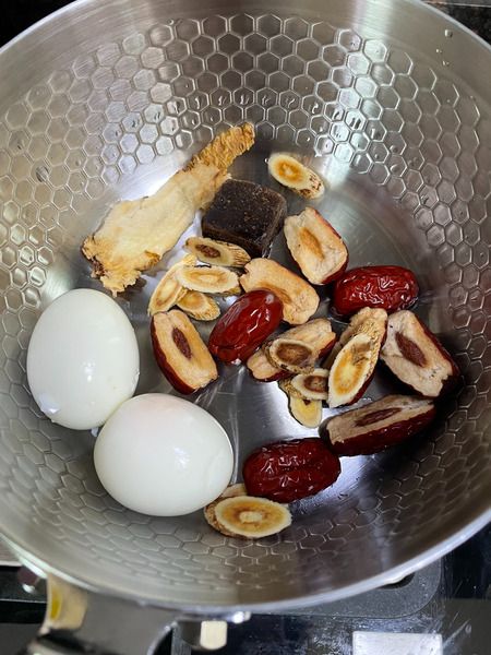 Step 1-2 boil and peel eggs cut red dates
