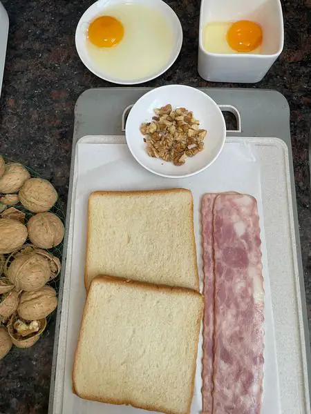 Step 1 Get everything ready crush the nut meat crack one egg preheat oven