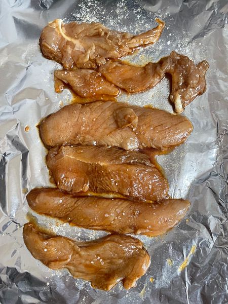 Step 3 spread the chicken slices on a baking tray